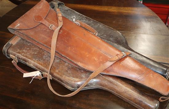 Three vintage leather gun cases